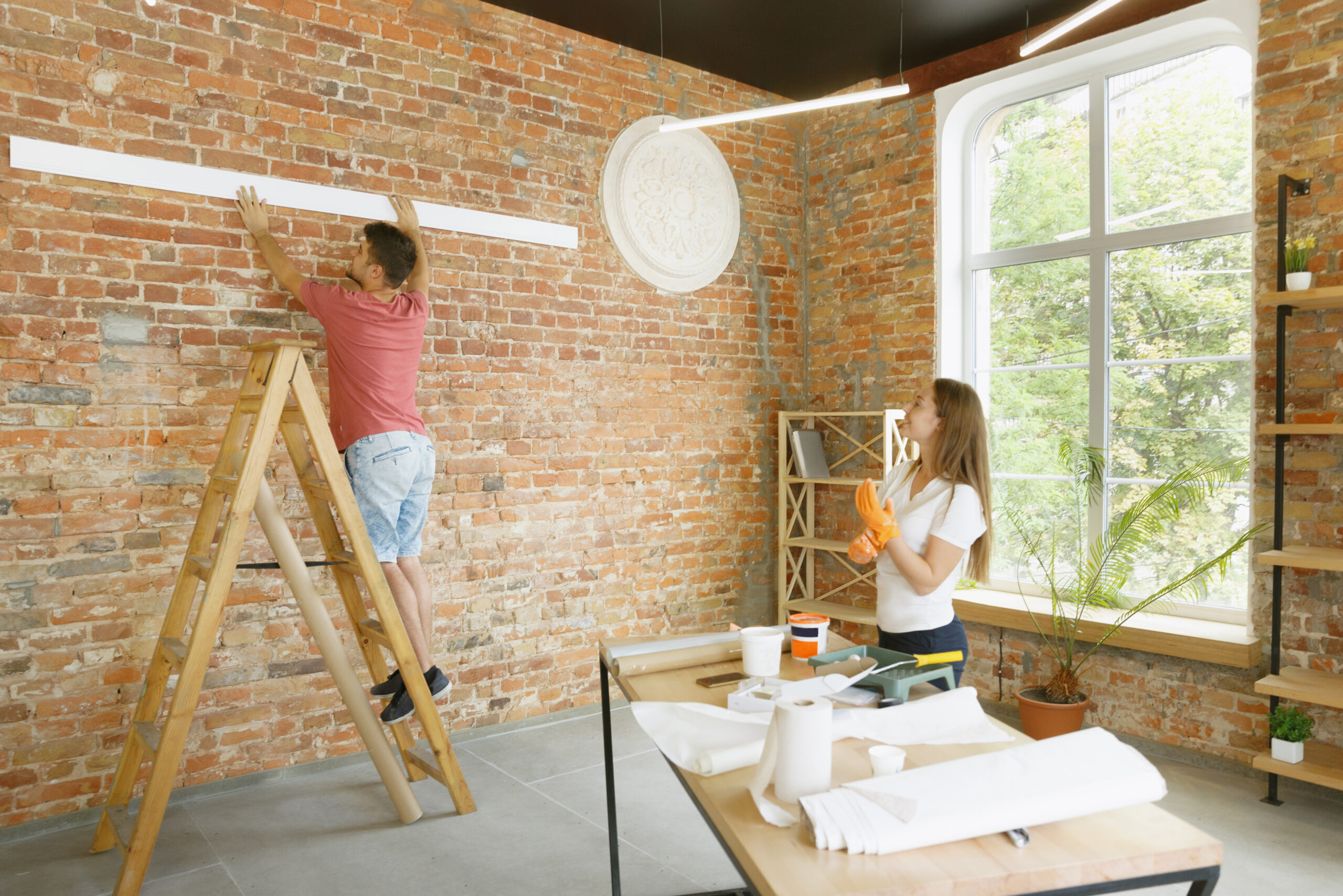 A couple starting home remodeling