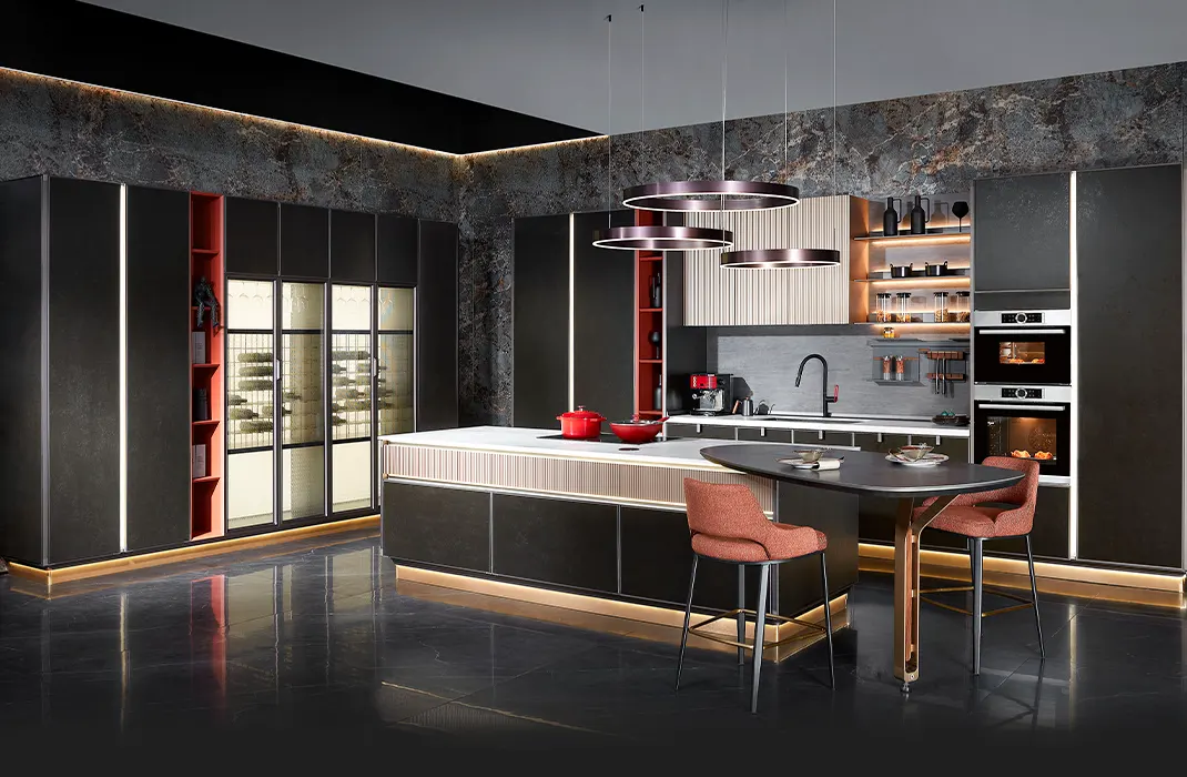 Sleek modern kitchen in Austin with minimalist cabinetry, quartz countertops, stylish lighting, and a large island with seating.