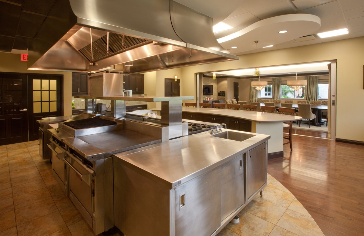Professional commercial kitchen maintenance in Austin, TX – technician servicing restaurant equipment